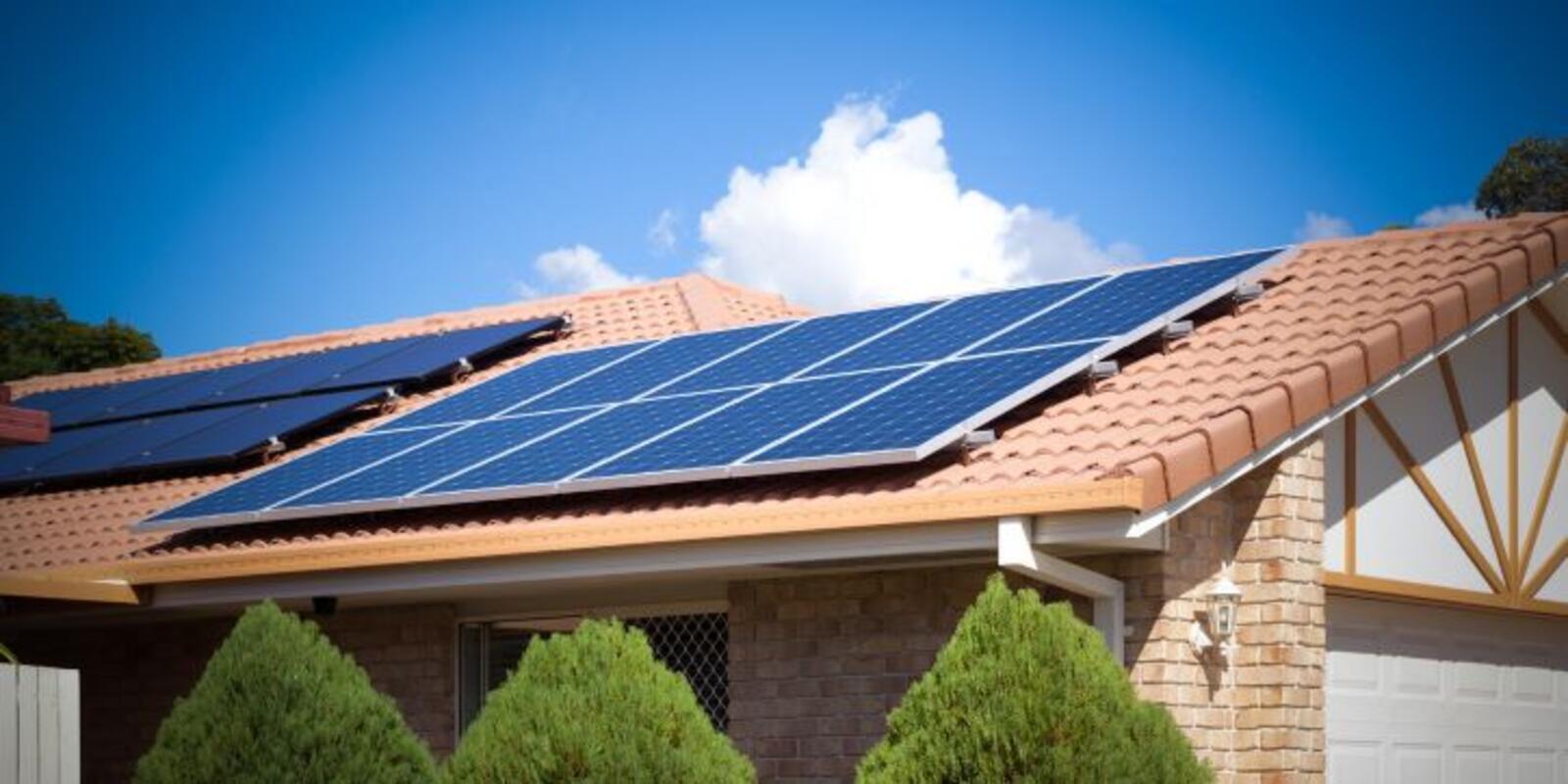 Solar panels on suburban house roof