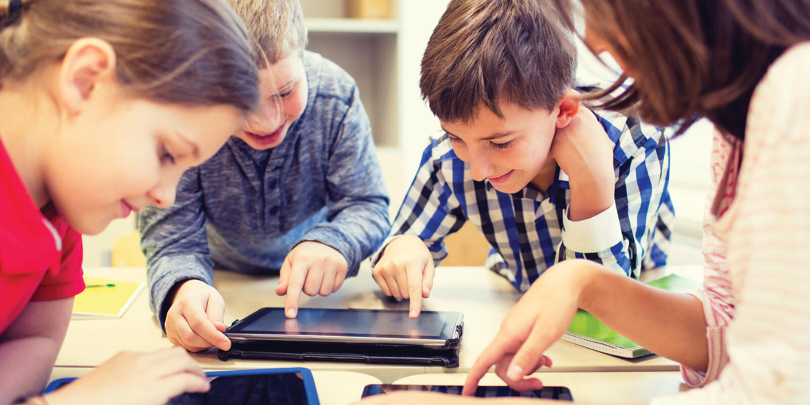 Schoolchildren using tablets